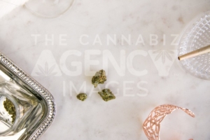 Marijuana Buds, Joint and Jar on Marble Vanity Luxury Cannabis - The Cannabiz Agency