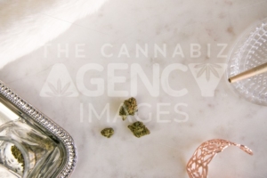 Marijuana Buds, Joint and Jar on Marble Vanity Luxury Cannabis - The Cannabiz Agency