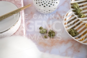 Marijuana Joint and Buds on Pink Marble Vanity Luxury Cannabis - The Cannabiz Agency