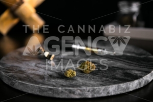 Marijuana Vape Pen, Concentrate and Buds on Dark Marble Luxury Cannabis - The Cannabiz Agency