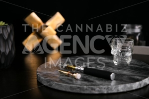 Marijuana Vape Pen and Concentrate on Dark Marble Luxury Cannabis - The Cannabiz Agency