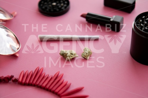 Festival Herbal Remedy on Pink with Red Necklace and Sunglasses – Portrait - Cannabis Royalty Free Stock Images