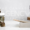 Flower Bud in Glass Jar with Roll on White Marble 3 - Cannabis Royalty Free Stock Images