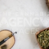 Pen, Flower and Reclaimed Wood Accessories on White Marble - Cannabis Royalty Free Stock Images