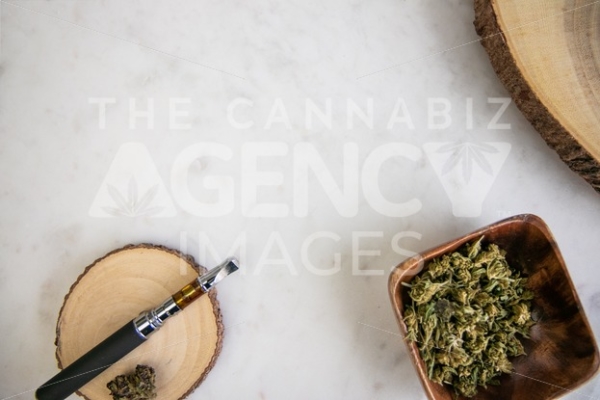 Pen, Flower and Reclaimed Wood Accessories on White Marble - Cannabis Royalty Free Stock Images