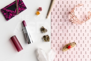Pink Pineapples and Lipstick Disarray – Top Down - Cannabis Royalty Free Stock Images